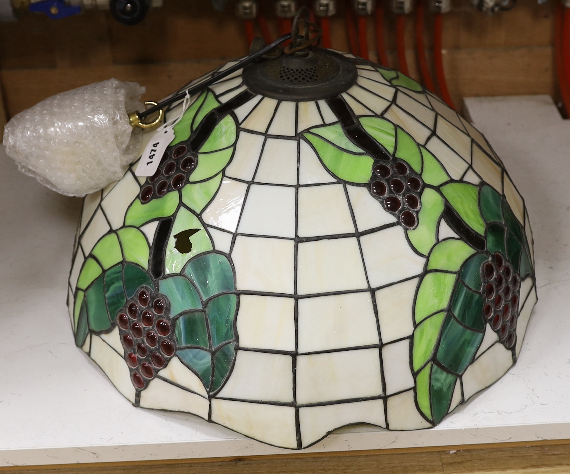 A Tiffany style circular ceiling light shade, 51cm diameter